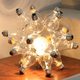 Illustration for article titled Crazy Sexy Cool Lamps, 100% Made From Bulbs